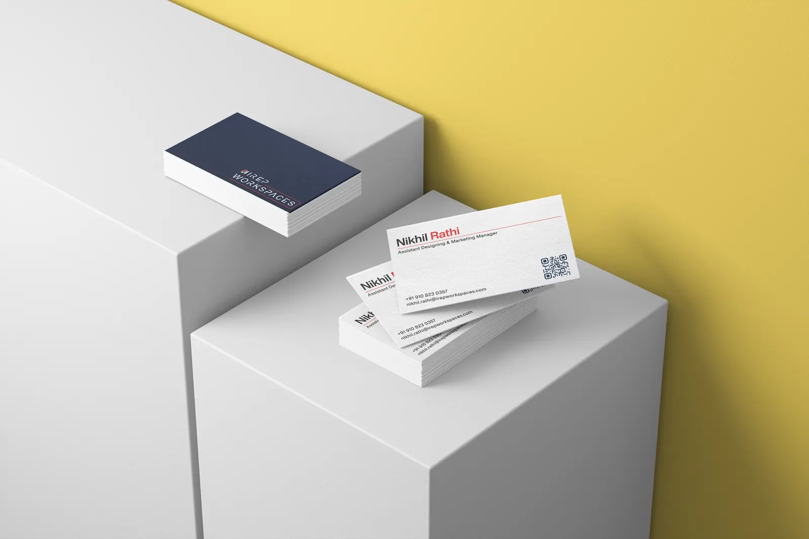 Business cards stacked on white blocks