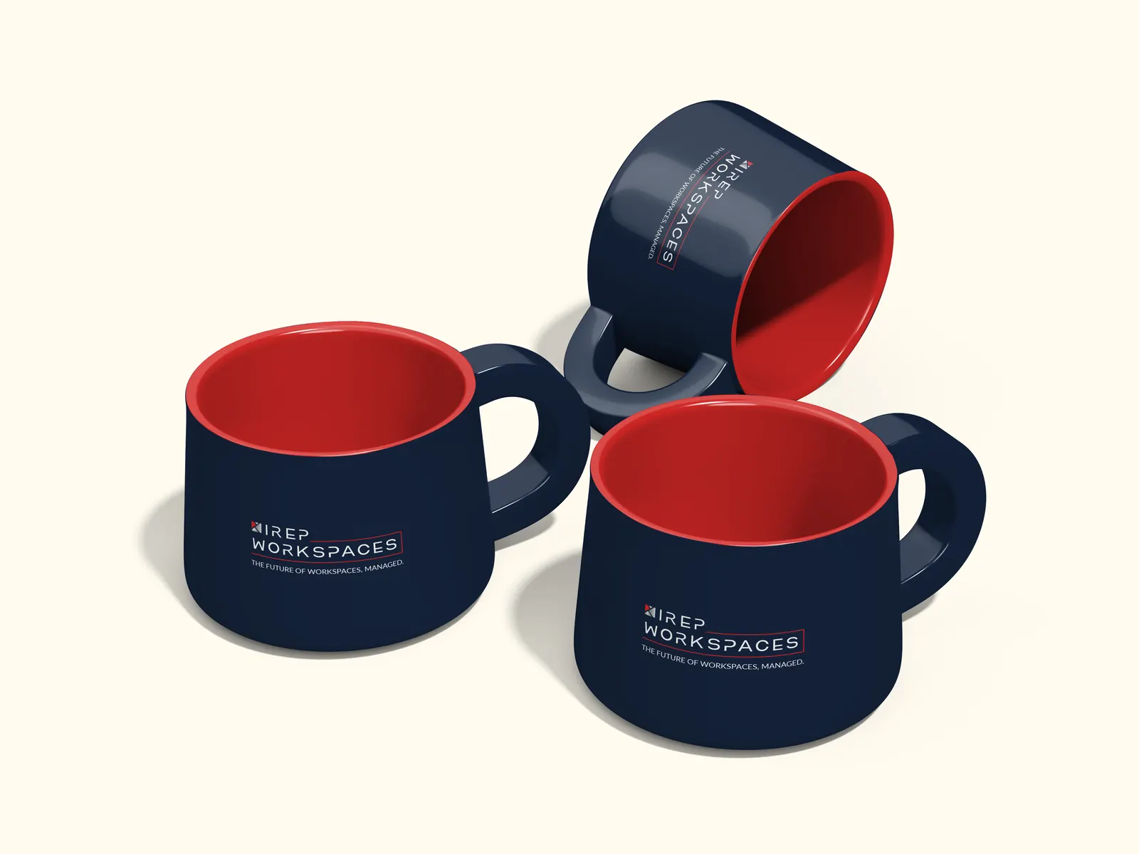 Navy mugs with red insides and the logo